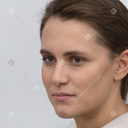 Neutral white young-adult female with short  brown hair and brown eyes