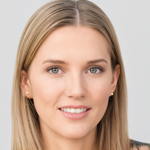 Joyful white young-adult female with long  brown hair and grey eyes