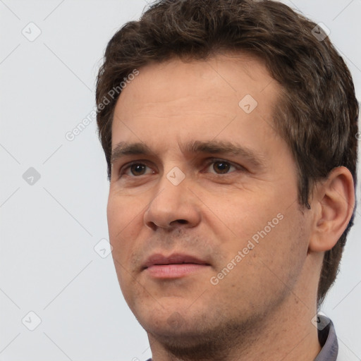 Neutral white adult male with short  brown hair and brown eyes