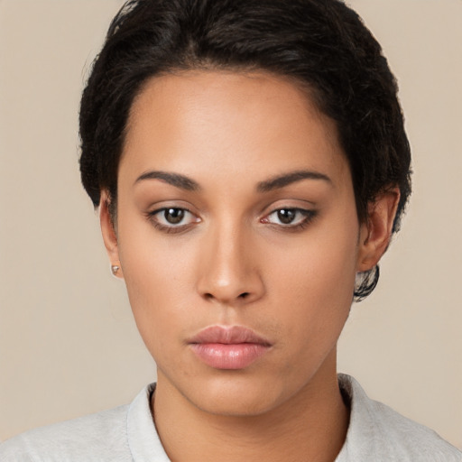 Neutral latino young-adult female with short  black hair and brown eyes