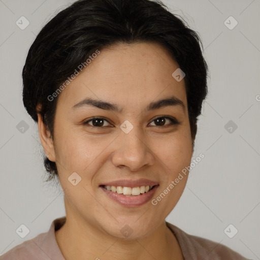 Joyful latino young-adult female with short  brown hair and brown eyes