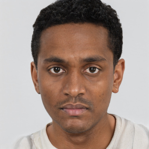Neutral black young-adult male with short  black hair and brown eyes