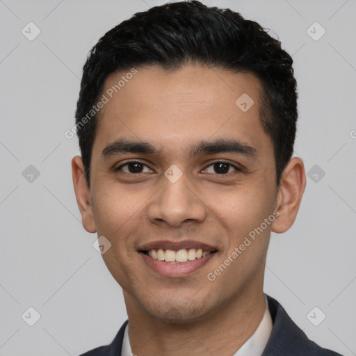 Joyful latino young-adult male with short  black hair and brown eyes