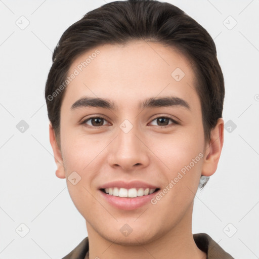 Joyful white young-adult male with short  brown hair and brown eyes