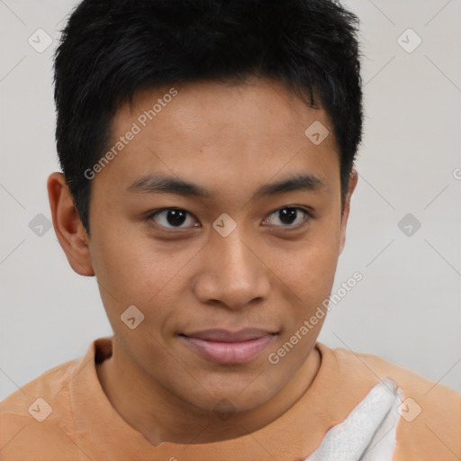 Joyful asian young-adult male with short  brown hair and brown eyes