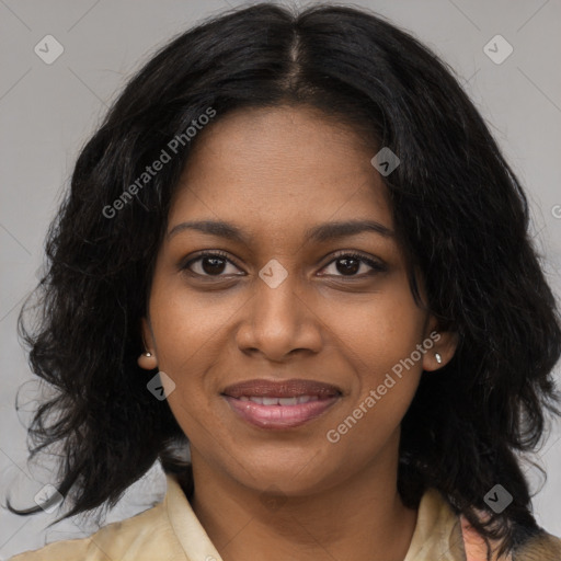 Joyful black young-adult female with long  black hair and brown eyes