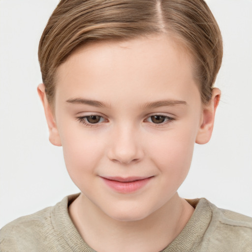 Joyful white child female with short  brown hair and brown eyes