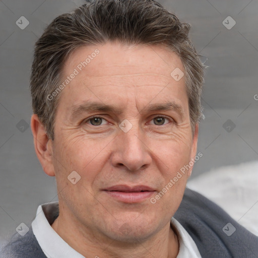 Joyful white middle-aged male with short  brown hair and brown eyes