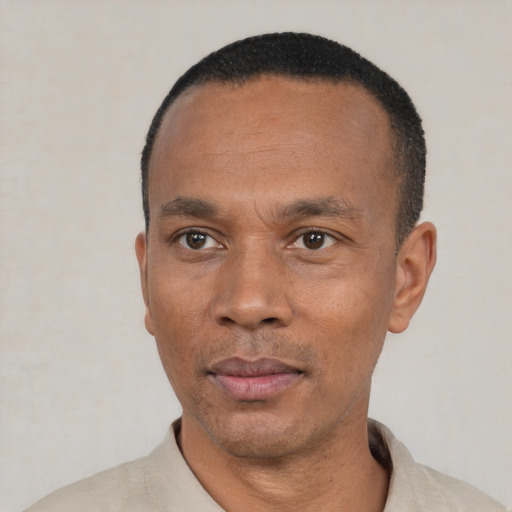 Neutral black adult male with short  black hair and brown eyes