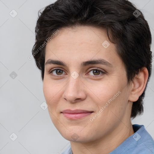 Joyful white adult female with short  brown hair and brown eyes