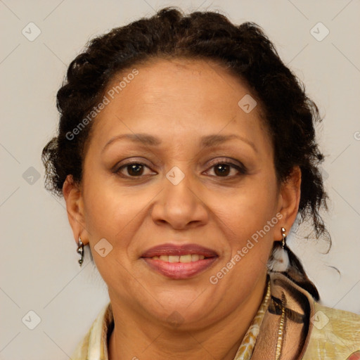 Joyful black adult female with medium  brown hair and brown eyes