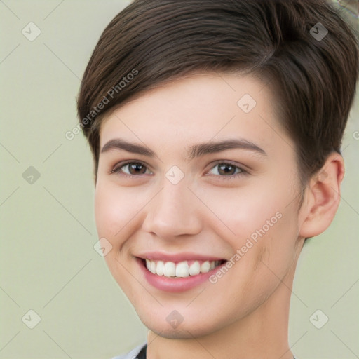 Joyful white young-adult female with short  brown hair and brown eyes