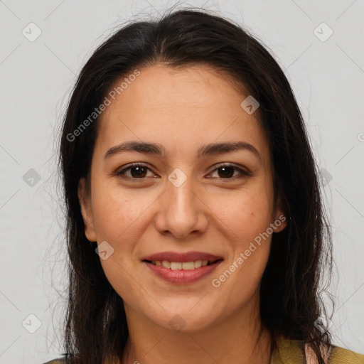 Joyful white young-adult female with long  brown hair and brown eyes