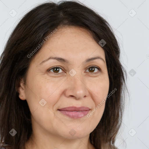 Joyful white adult female with medium  brown hair and brown eyes