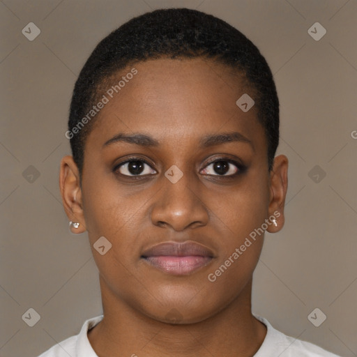 Joyful black young-adult female with short  brown hair and brown eyes