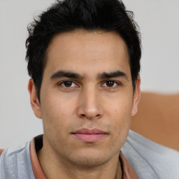 Neutral asian young-adult male with short  brown hair and brown eyes