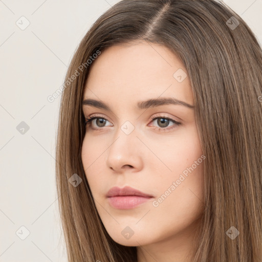 Neutral white young-adult female with long  brown hair and brown eyes