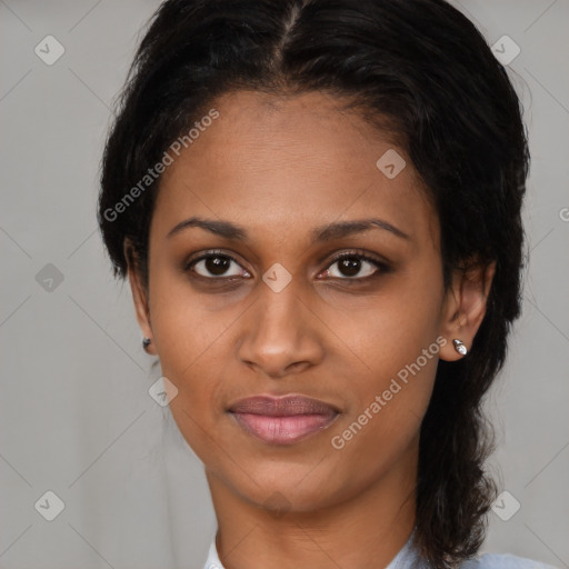 Joyful black young-adult female with medium  brown hair and brown eyes