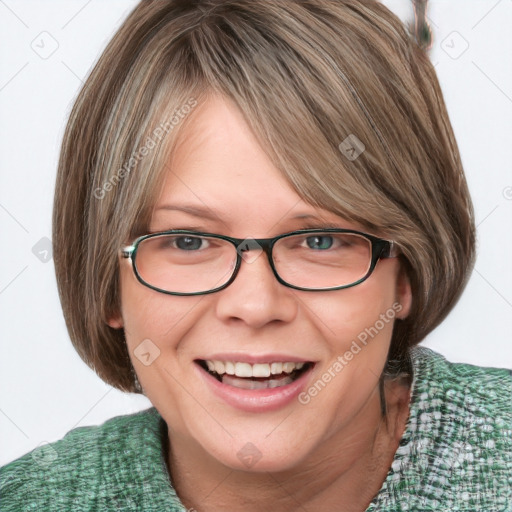 Joyful white young-adult female with medium  brown hair and green eyes