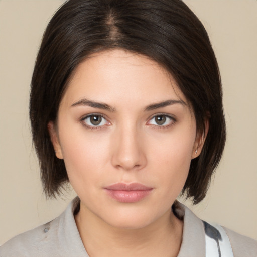 Neutral white young-adult female with medium  brown hair and brown eyes