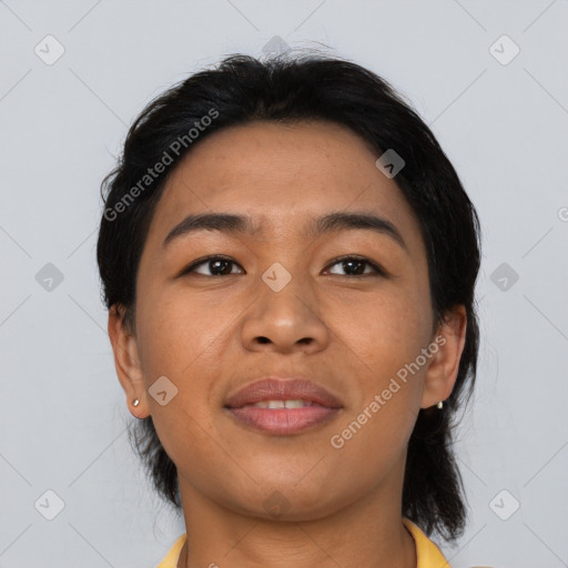 Joyful asian young-adult female with short  black hair and brown eyes