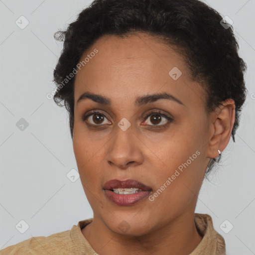 Joyful latino young-adult female with short  brown hair and brown eyes