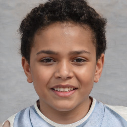 Joyful white child female with short  brown hair and brown eyes