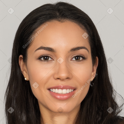 Joyful latino young-adult female with long  brown hair and brown eyes