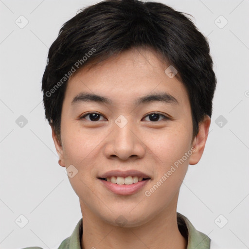 Joyful asian young-adult male with short  brown hair and brown eyes