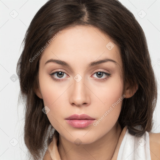 Neutral white young-adult female with medium  brown hair and brown eyes