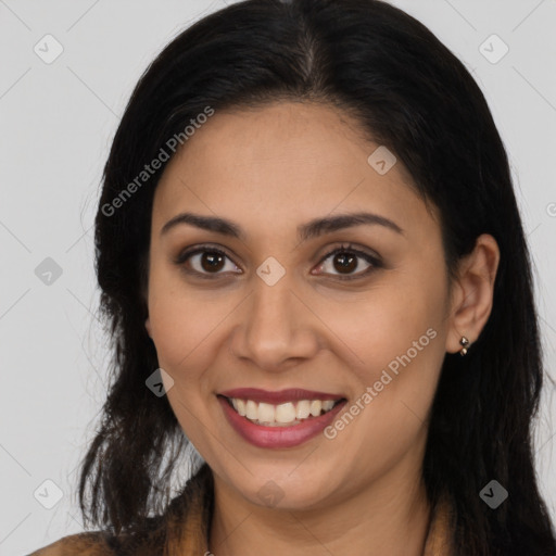 Joyful latino young-adult female with long  brown hair and brown eyes