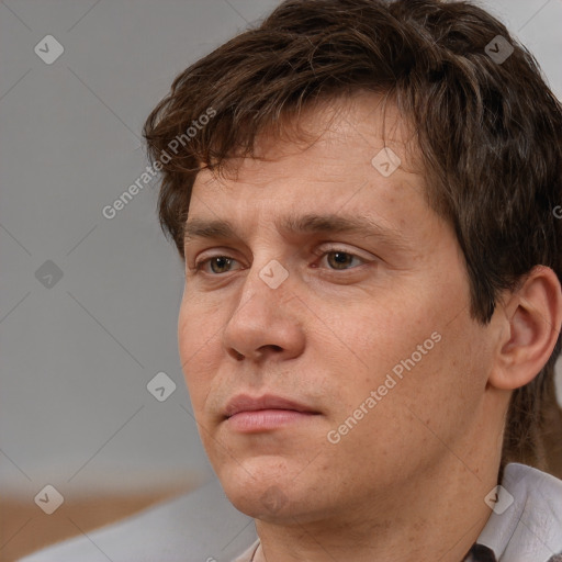 Neutral white adult male with short  brown hair and brown eyes