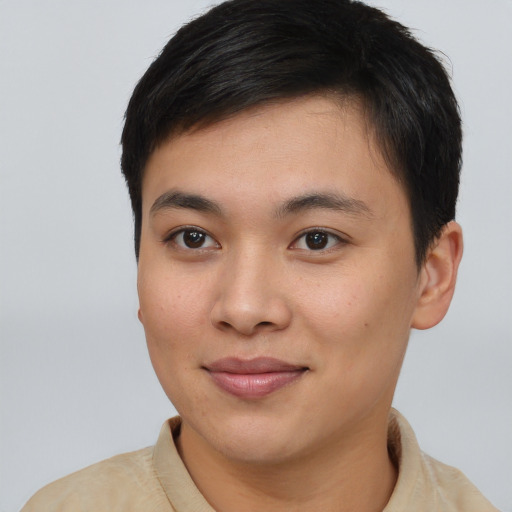 Joyful asian young-adult female with short  brown hair and brown eyes