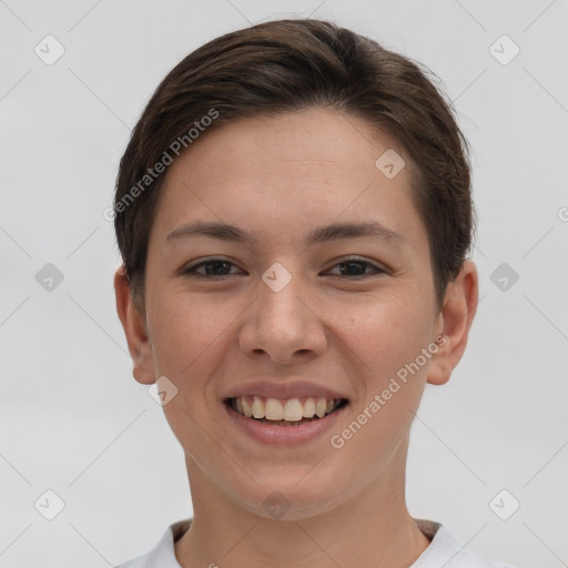 Joyful white young-adult female with short  brown hair and brown eyes