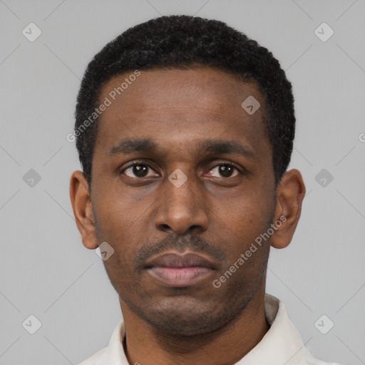 Neutral black young-adult male with short  black hair and brown eyes