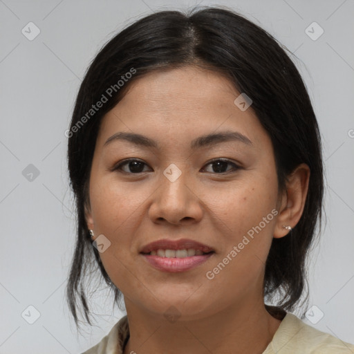 Joyful asian young-adult female with medium  brown hair and brown eyes