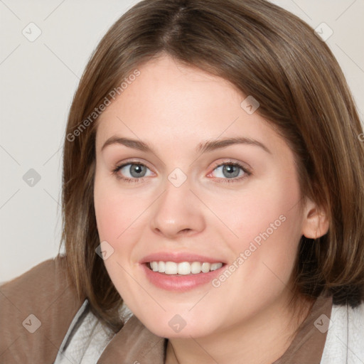 Joyful white young-adult female with medium  brown hair and blue eyes