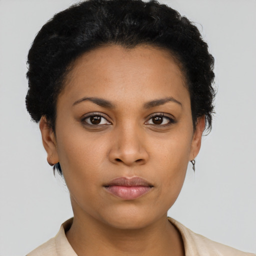 Neutral latino young-adult female with short  black hair and brown eyes