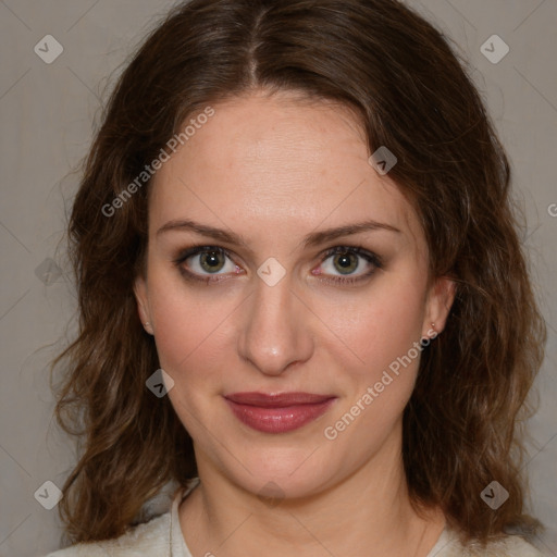 Joyful white young-adult female with medium  brown hair and green eyes