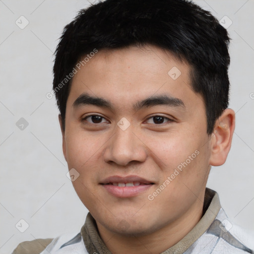 Joyful white young-adult male with short  black hair and brown eyes