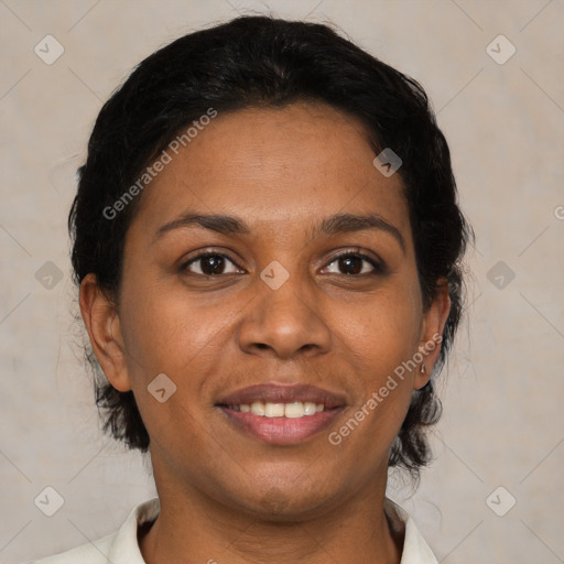 Joyful black young-adult female with medium  brown hair and brown eyes