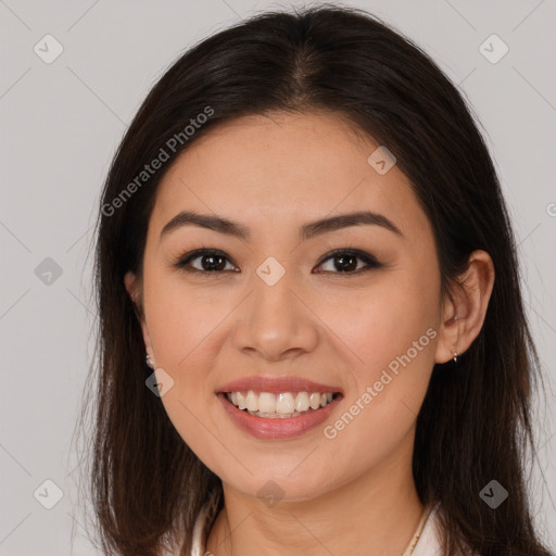 Joyful white young-adult female with long  brown hair and brown eyes