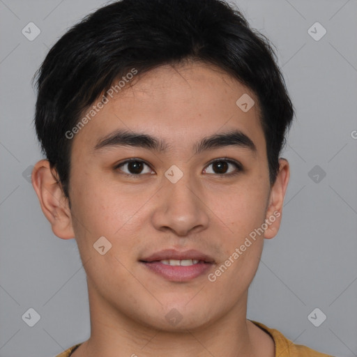 Joyful asian young-adult male with short  brown hair and brown eyes