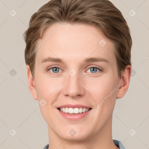 Joyful white young-adult female with short  brown hair and grey eyes