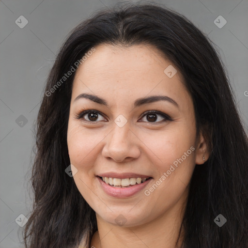 Joyful latino young-adult female with long  brown hair and brown eyes