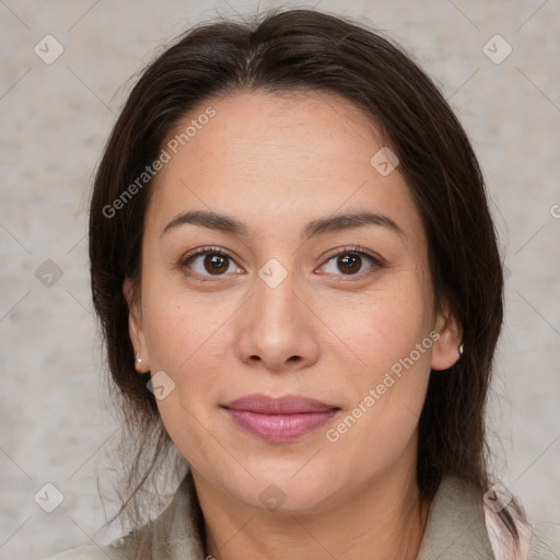 Joyful white adult female with medium  brown hair and brown eyes