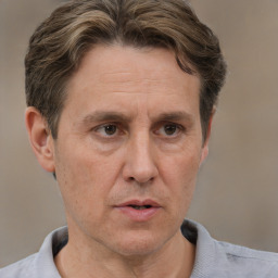 Neutral white adult male with short  brown hair and brown eyes