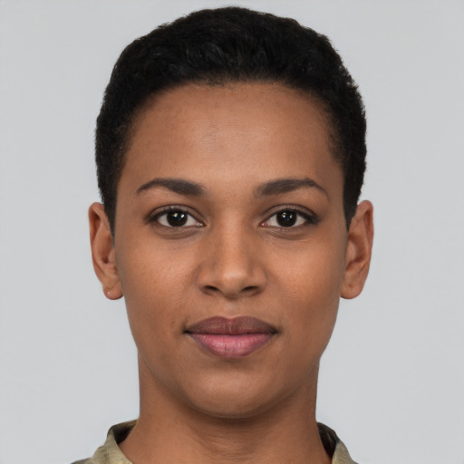 Joyful black young-adult female with short  black hair and brown eyes
