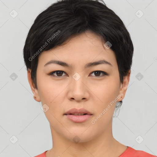 Joyful asian young-adult female with short  black hair and brown eyes