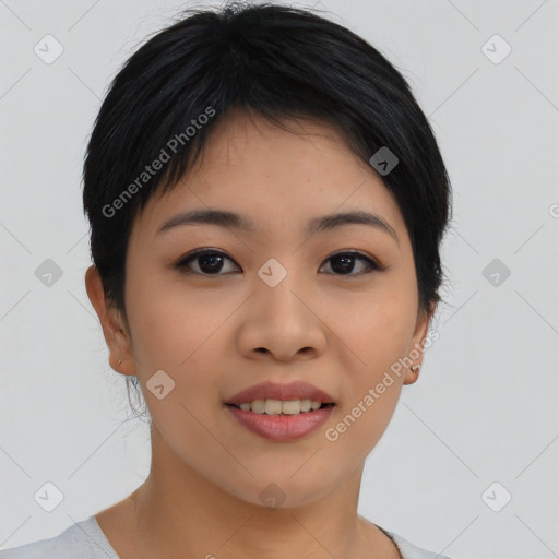 Joyful asian young-adult female with short  black hair and brown eyes